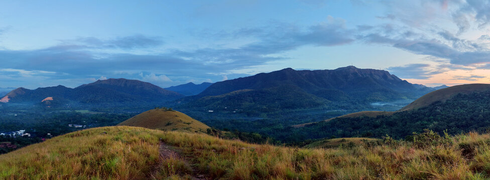 Panoramic view of Coron Town harbor and distant limestone islands at sunrise seen from Mount Tapyas summit on Busuanga Island, Palawan