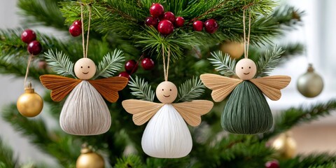 Fototapeta premium Handmade angel ornaments hanging on Christmas tree