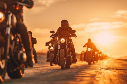 Motorcycle gang rides into sunset as bikers gather on open road for camaraderie and adventure