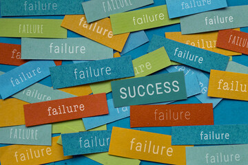 Success after failure concept, Success Surrounded by Failures – Motivation and Perseverance Concept , many colorful papers with words written on it
