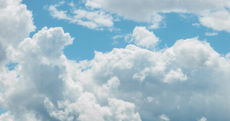 Beautifull light blue sky with dreamy clouds. A background for design