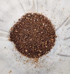 Medium-Coarse Coffee Grounds on Paper Filter for V60 Manual Pour-Over Brewing