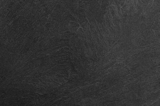 Dark grey black slate background or texture.