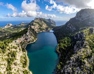 Aerial panorama of a tranquil lake surrounded by mountains and verdant trees under a blue sky