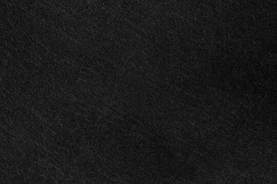 Dark grey black slate background or texture.