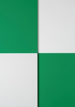 A dynamic split screen showcasing a vibrant emerald green color block contrasting sharply with a pure, neutral white backdrop surface, surface, duo, opposition