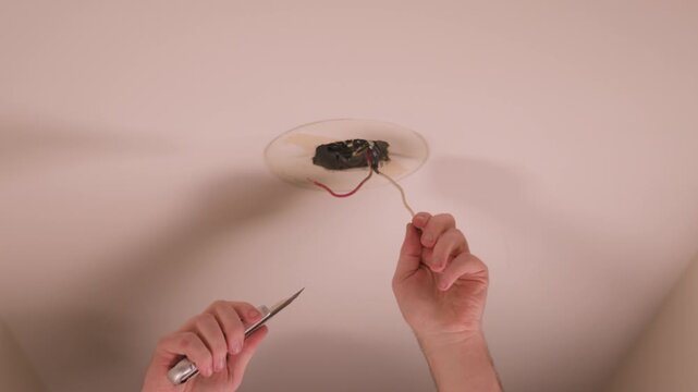 Messing around with the stuck cap on a hot wire.