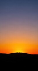 Obraz premium Golden hour sunset silhouettes the tranquil landscape as peaceful dusk transitions into the serene beauty of the coming night, horizon, serene, dusk
