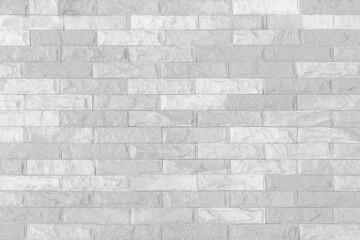 Surface white wall of stone wall gray tones for use as background.