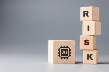 AI chip block placed beside stacked RISK letters representing ai adoption risk assessment awareness and management in modern technology environments