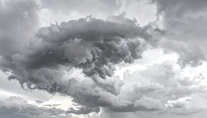 A dramatic sky filled with dark, layered, and textured cumulonimbus clouds, possibly indicating an impending storm
