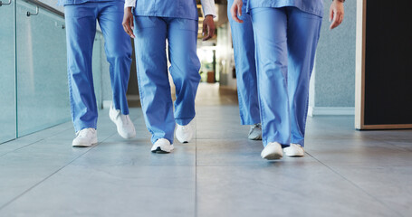 Legs, people and nurses walking in hospital for staff duty, shift change and medical services....