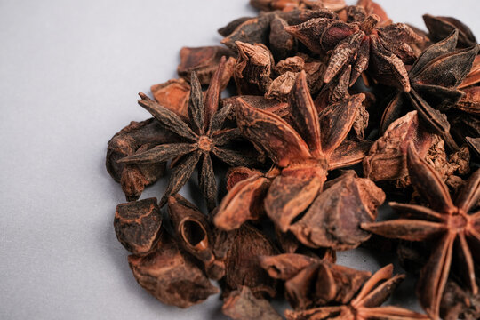Detailed Macro View of Dried Star Anise Pods (Illicium verum) Demonstrating Unique Botanical Structure and Culinary Spice Qua