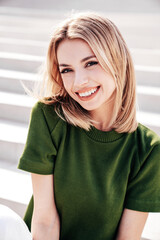 Young beautiful smiling modern woman in trendy summer clothes. Sexy carefree model posing on the...