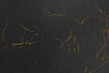 A background material featuring a luxurious black washi paper texture with gold patterns