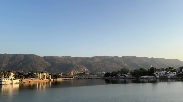 View of Pushkar sarovaror lake and ghats alongside the Hills of Aravalli Range from a cafe