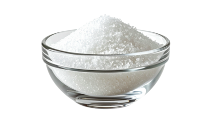 A clear glass bowl filled to the brim with coarse, white, crystalline granules against black