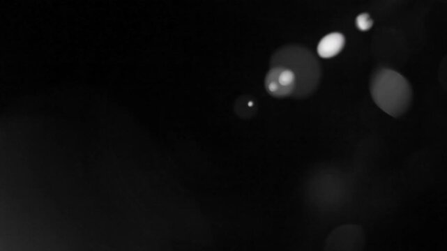 Lucent Zoom Collection: Diagonally lined spherical lens flare with a violet hue and wobbling effect 4k