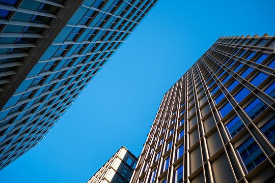 Corporate building in modern architecture style, urban skyscraper with glass facade in stockholm presenting office exterior and contemporary commercial presence