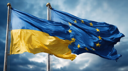 ukrainian flag and eu flag waving in the wind. ukraine membership goals for the european union