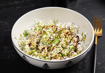 Avocado ricotta salad appetizer with soy sauce. Healthy food.