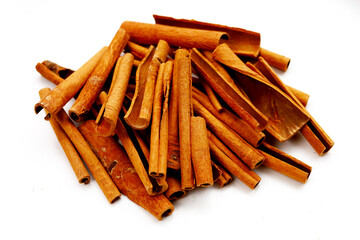 Dried cinnamon sticks arranged in a bundle.