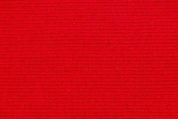 Fototapeta premium Cotton texture pattern closeup. Macro shot red cotton texture background. Knitting pattern of cotton. Texture of fabric