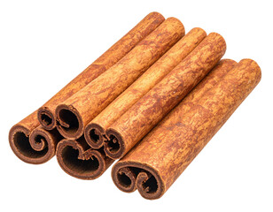 Close-up of several cinnamon sticks on a transparent background