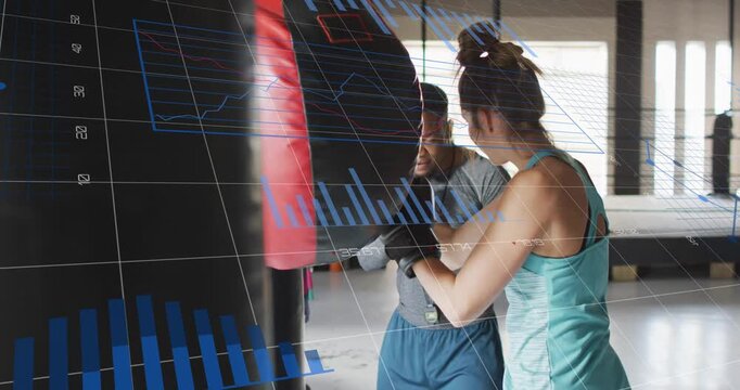 Coach cueing trainee throwing combos into bag in gym, charts overlaying action to refine technique