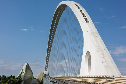 Reggio Emilia - june 29 2025: Close Up Detail Of Slender White Bridge Arch And Intersecting Suspension Cables, Reggio Emilia, Italy