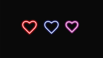 Neon heart shapes in red, blue, and purple on a