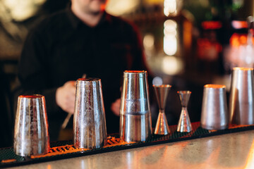 Bartender Tools on Counter in Modern Bar Setting