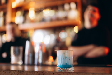 Colorful Cocktail on Bar Counter with Blurred Background