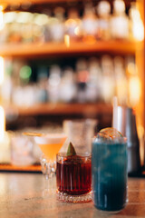 Colorful Cocktails on a Bar Counter with a Blurred Background