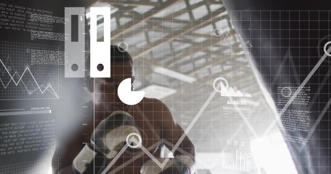 Male boxer shifting weight, training and striking heavy bag while HUD charts tracking data