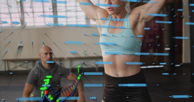 Woman lifter lowering bar into overhead squat AR tracking motion or force for training coach spottin