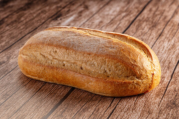 Rustic crusty brown loaf bread