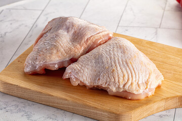 Raw chicken thighs for cooking