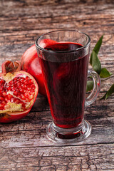 Sweet fresh pomegranate juice glass