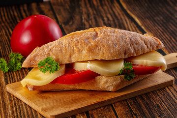 Sandwich with mozzarella and tomato