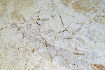 Cracked dry weathered wall surface texture background