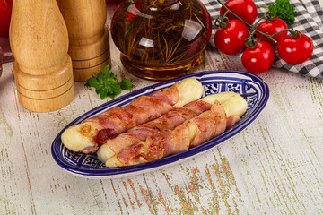 Hot mozzarella sticks with bacon