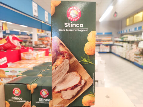 Rome, Italy - December 09, 2025: Stinco packaging displayed prominently in a grocery store aisle, showcasing a delicious meat dish with vibrant colors and appealing design elements