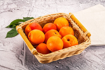 Raw ripe sweet apricots heap