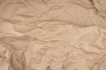 Obraz premium Crumpled brown paper texture background. Old paper background. Old crumpled vintage paper surface.