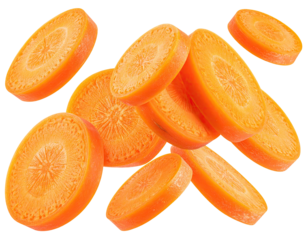 Sliced orange carrot pieces isolated against a black background