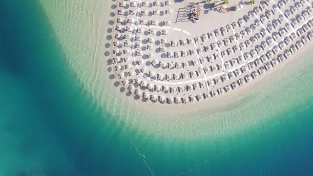 Aerial view of beach with umbrellas and turquoise sea, Oludeniz, Fethiye, Turkey