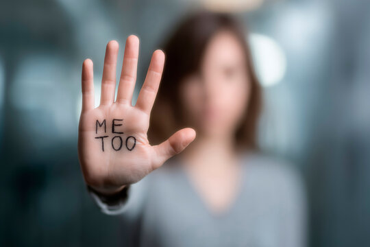 Woman showing Me Too message on hand against gender violence