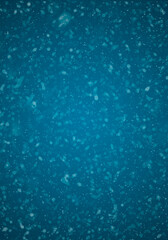 Fototapeta premium Fondo navideño abstracto de color azul con textura de nieve y bokeh