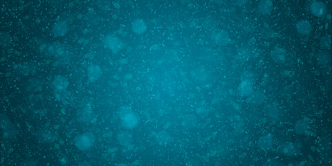 Fondo navideño abstracto de color azul profundo con textura de nieve y bokeh